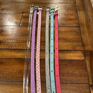 Like new 6 multi-color girls belts. Size M.